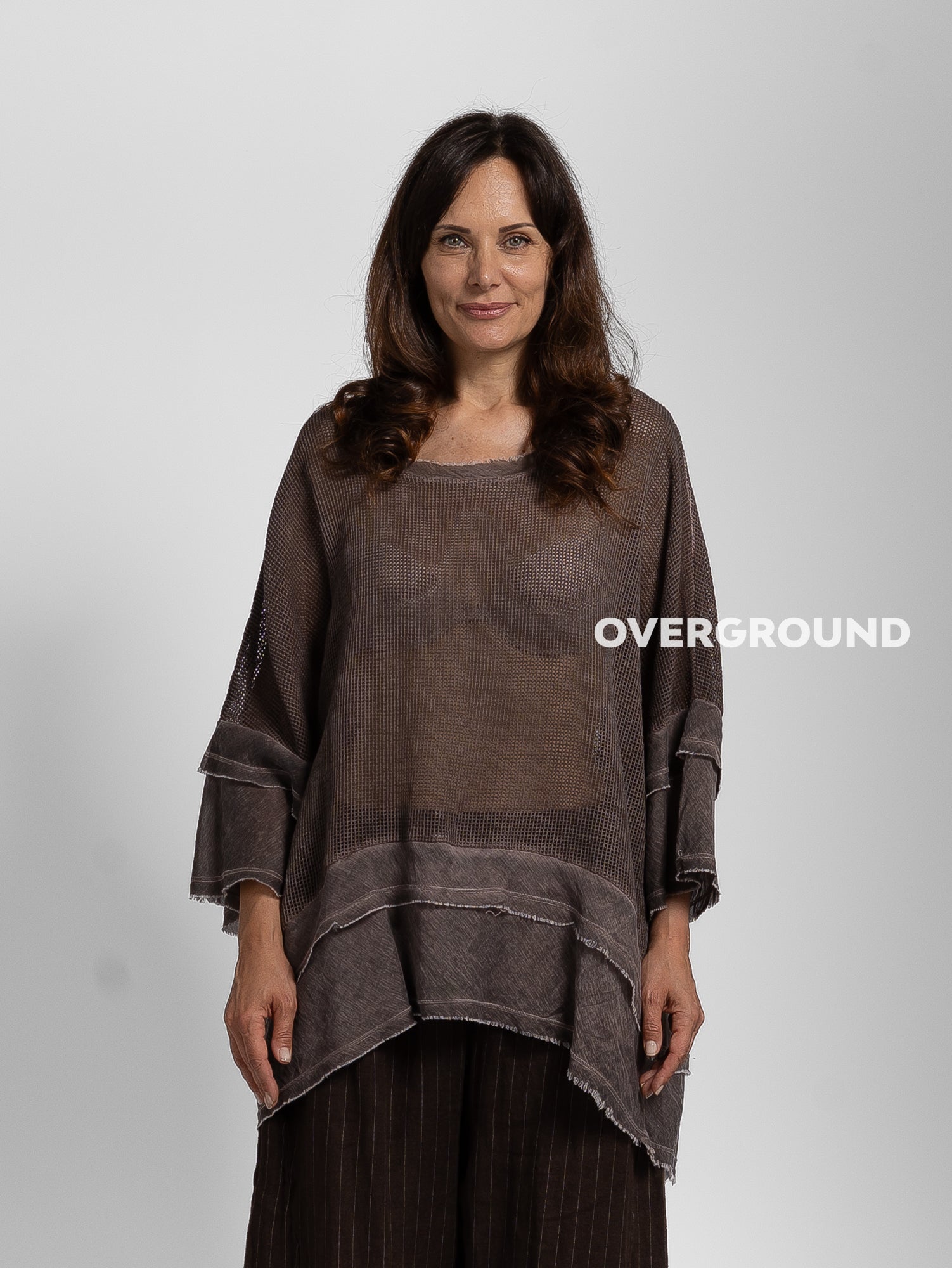 BLUSA OVER CON RETE BALZA IN FONDO