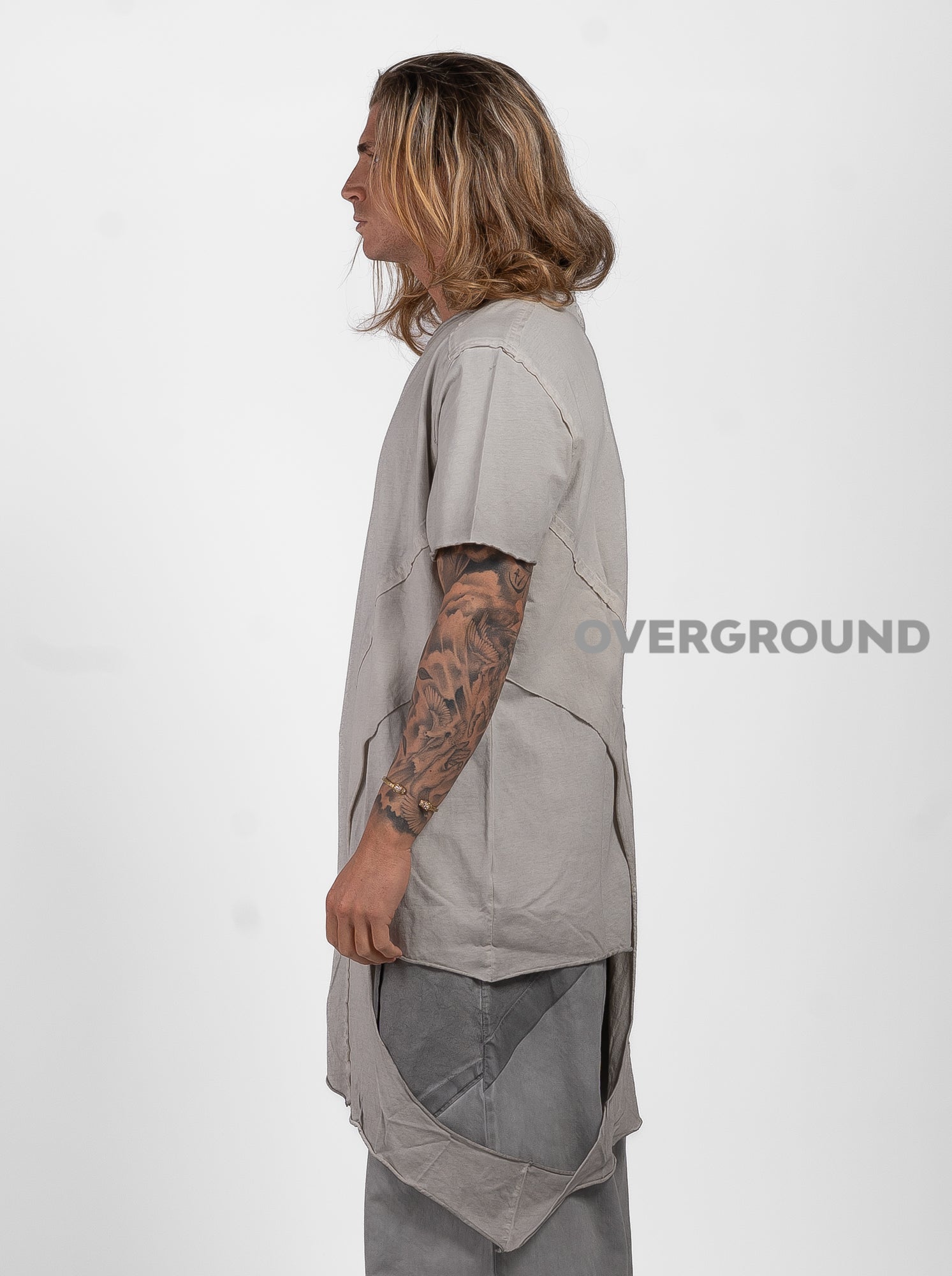 MAGLIA ASIMMETRICA CON SPACCO STONDATO LATERALE - OVERGROUND STORE