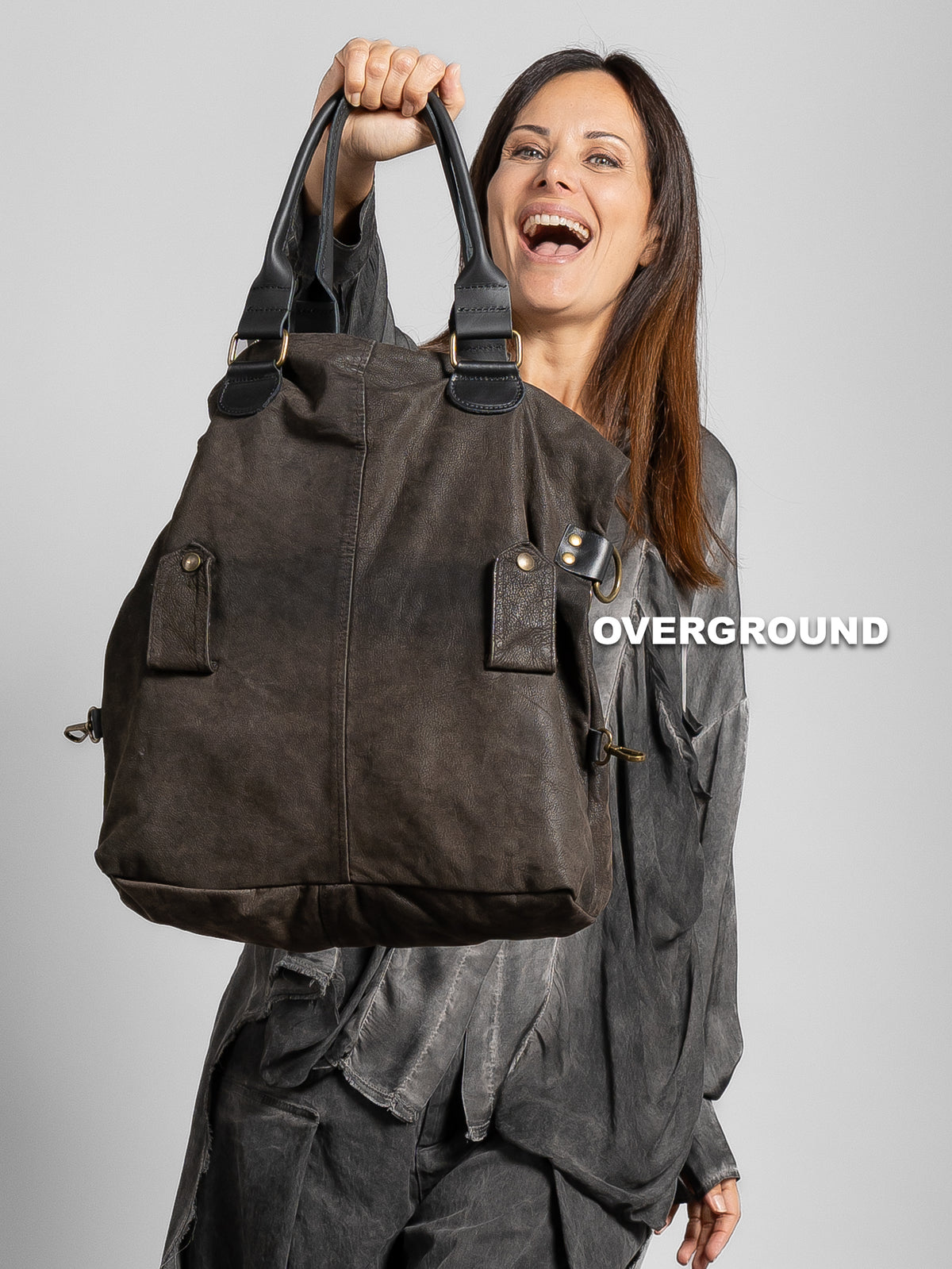 BORSA PELLE CON CERNIERE E BOTTONI