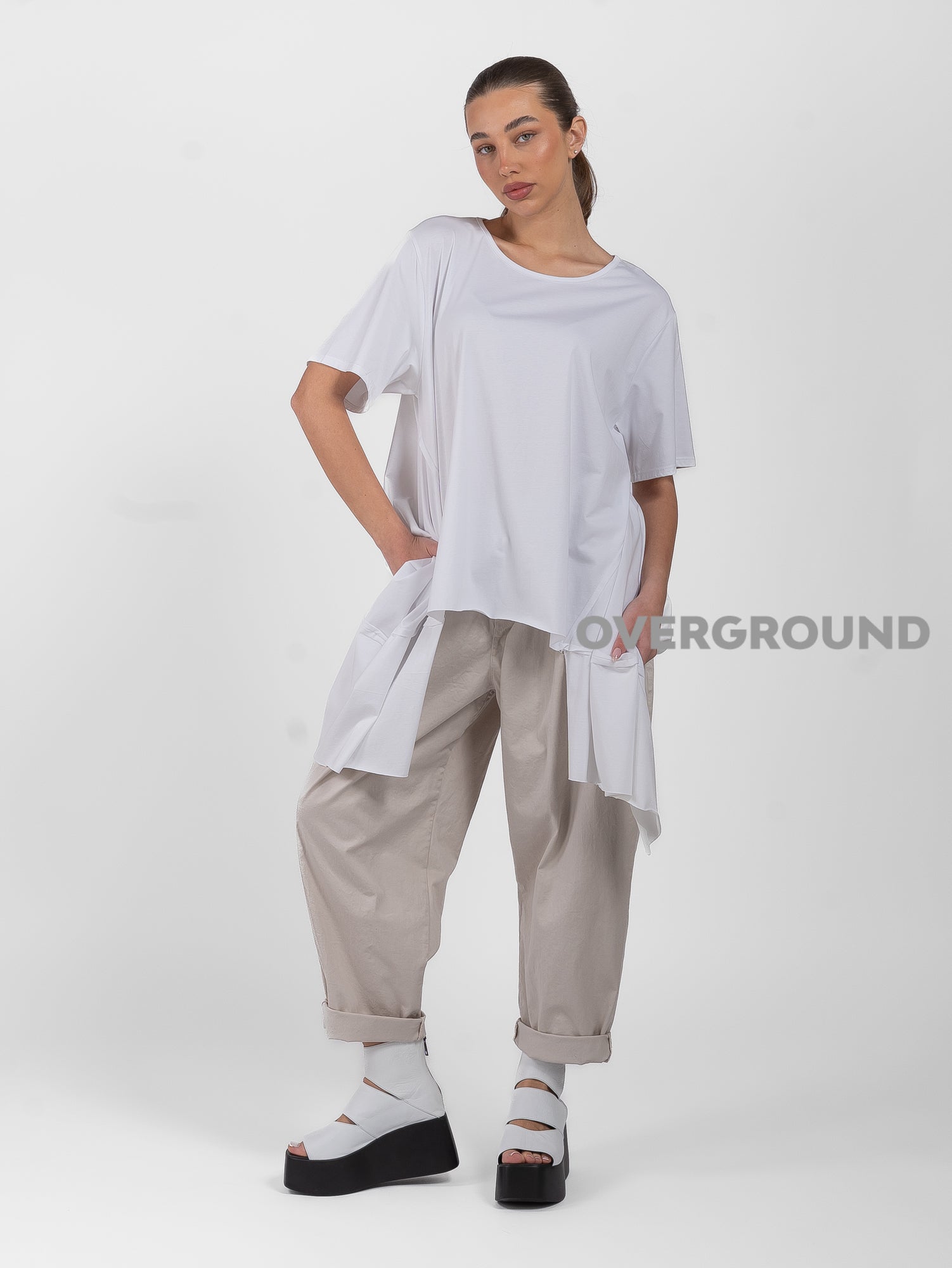 MAGLIA LUNGA ASIMMETRICA CON PUNTE LATERALI E CUCITURE - OVERGROUND STORE