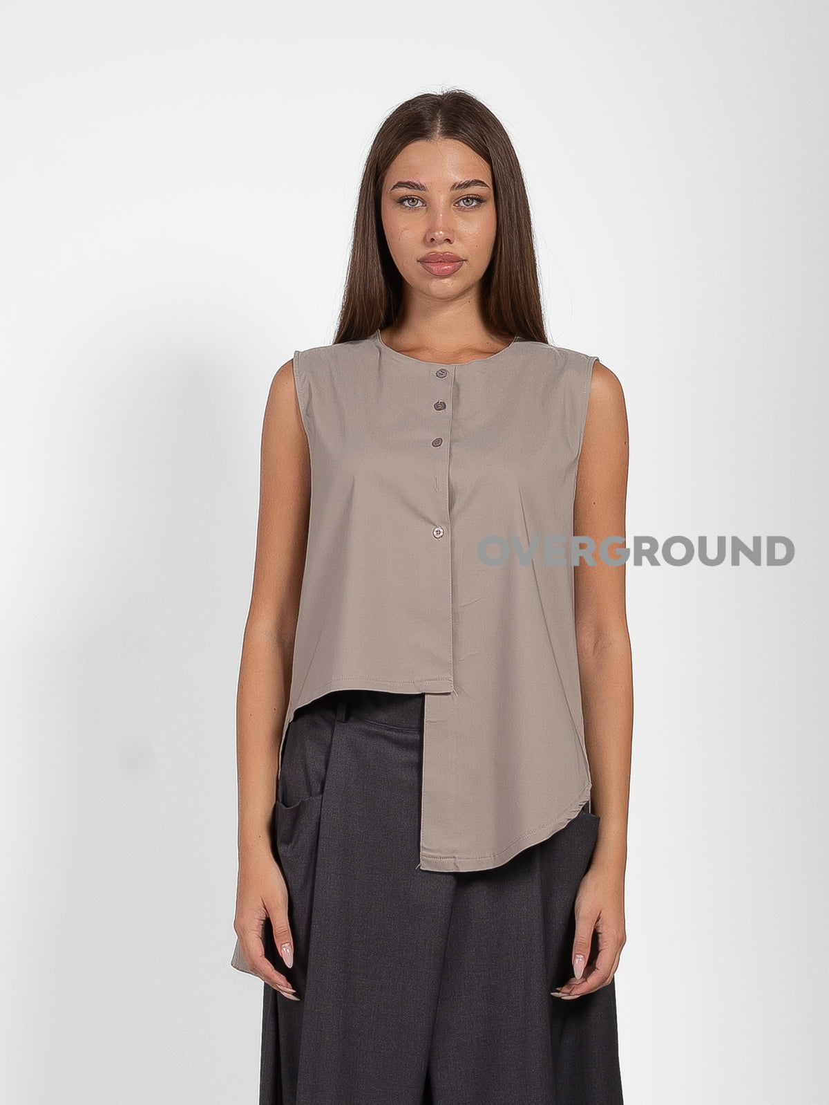GILET ASIMMETRICO CON PUNTE