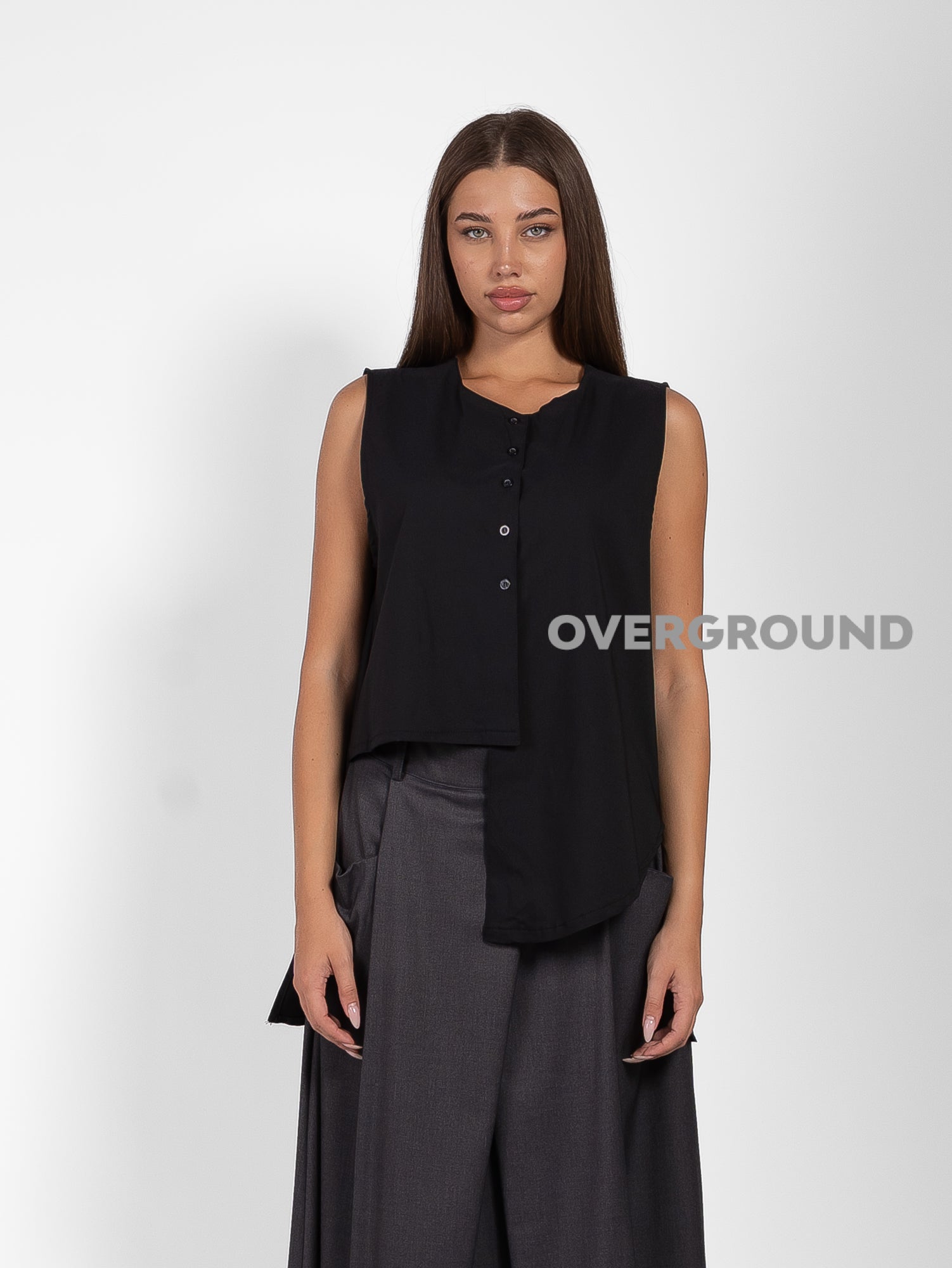 GILET ASIMMETRICO CON PUNTE