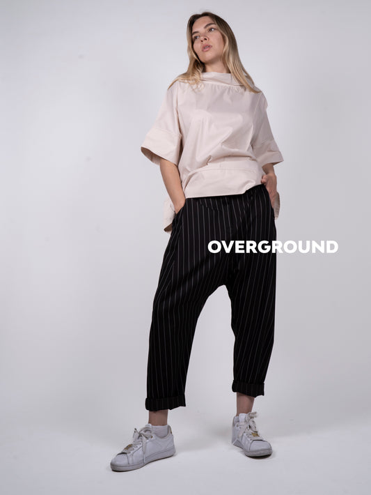 BLUSA OVER CON COLLO A BARCA E BALZA IN FONDO