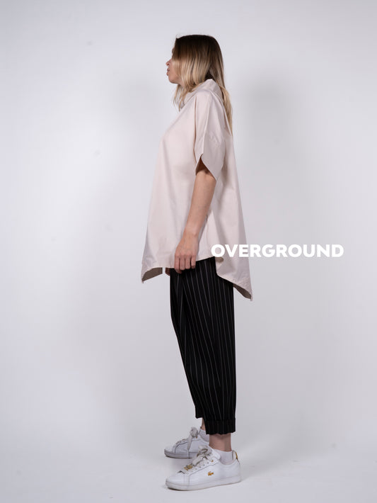 BLUSA OVER CON COLLO A BARCA E BALZA IN FONDO