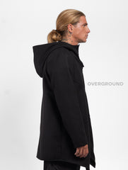 Giaccone asimmetrico con cappuccio e cerniera e bottoni - OVERGROUND STORE