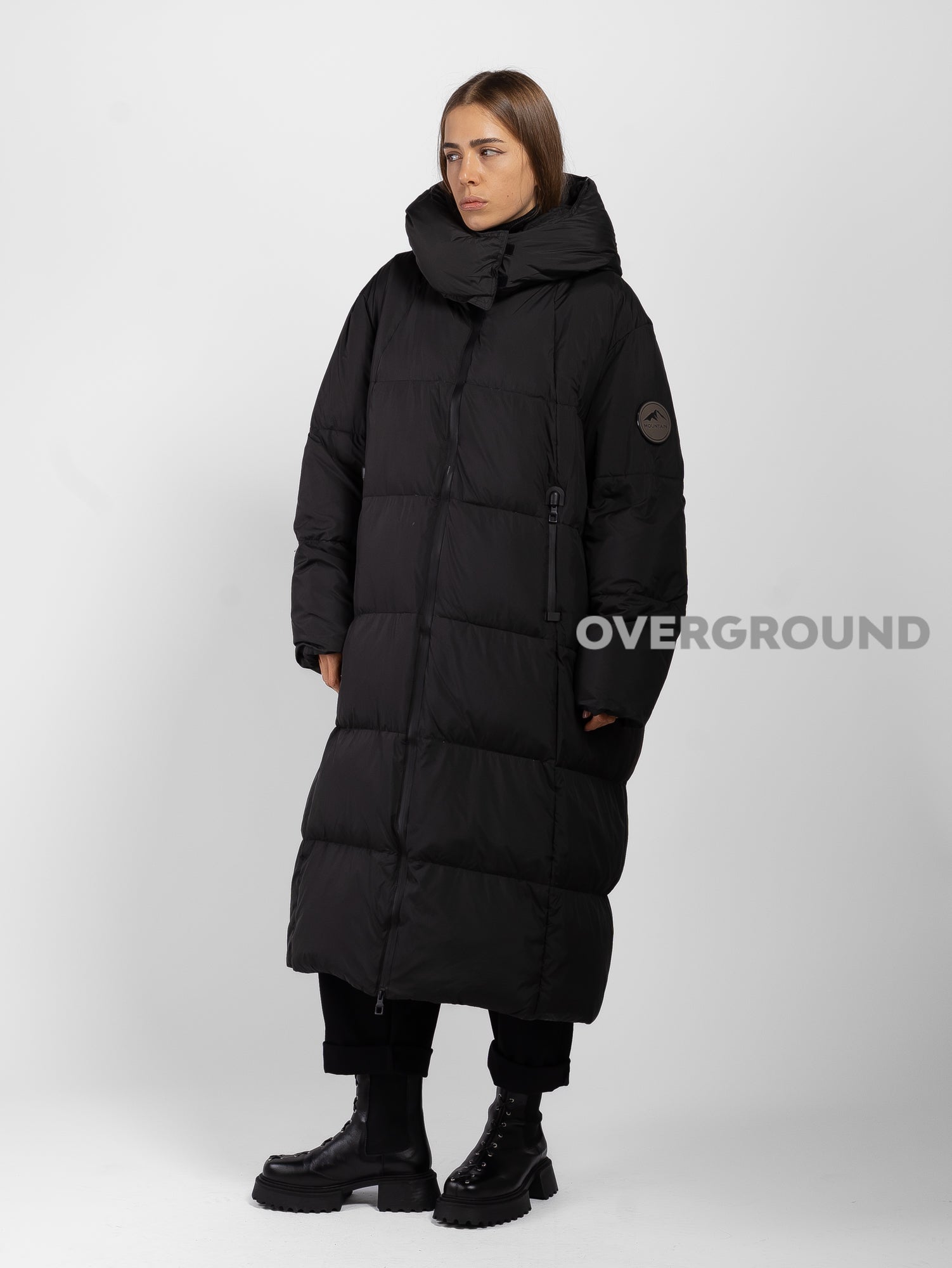 PIUMINO OVER CON TASCHE CON CERNIERA