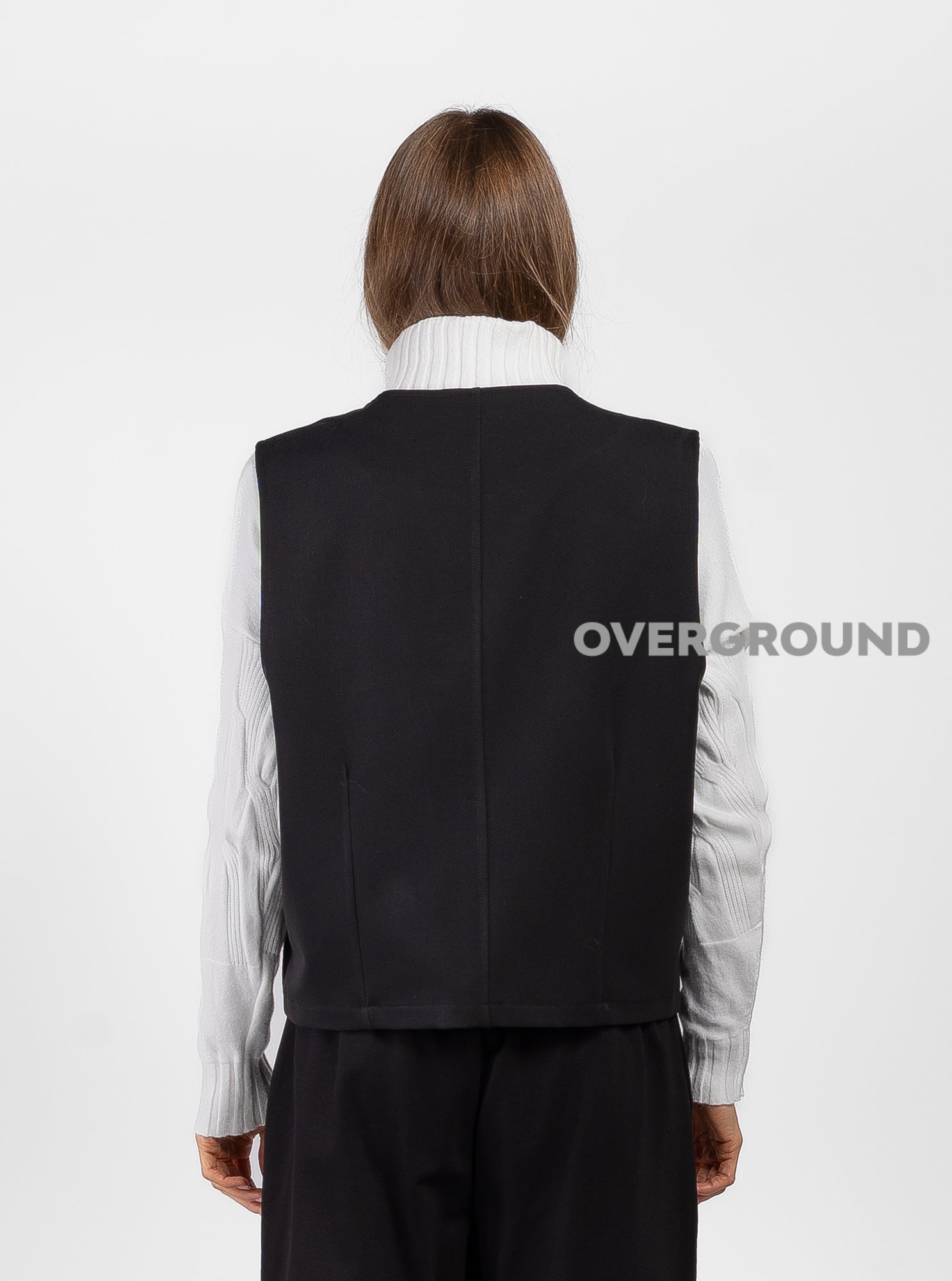 VEST WITH ASYMMETRIC BUTTONING