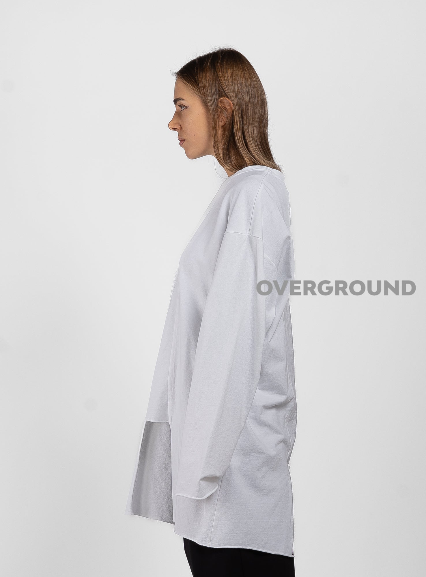 MAGLIA OVER ASIMMETRICA CON CUCITURE