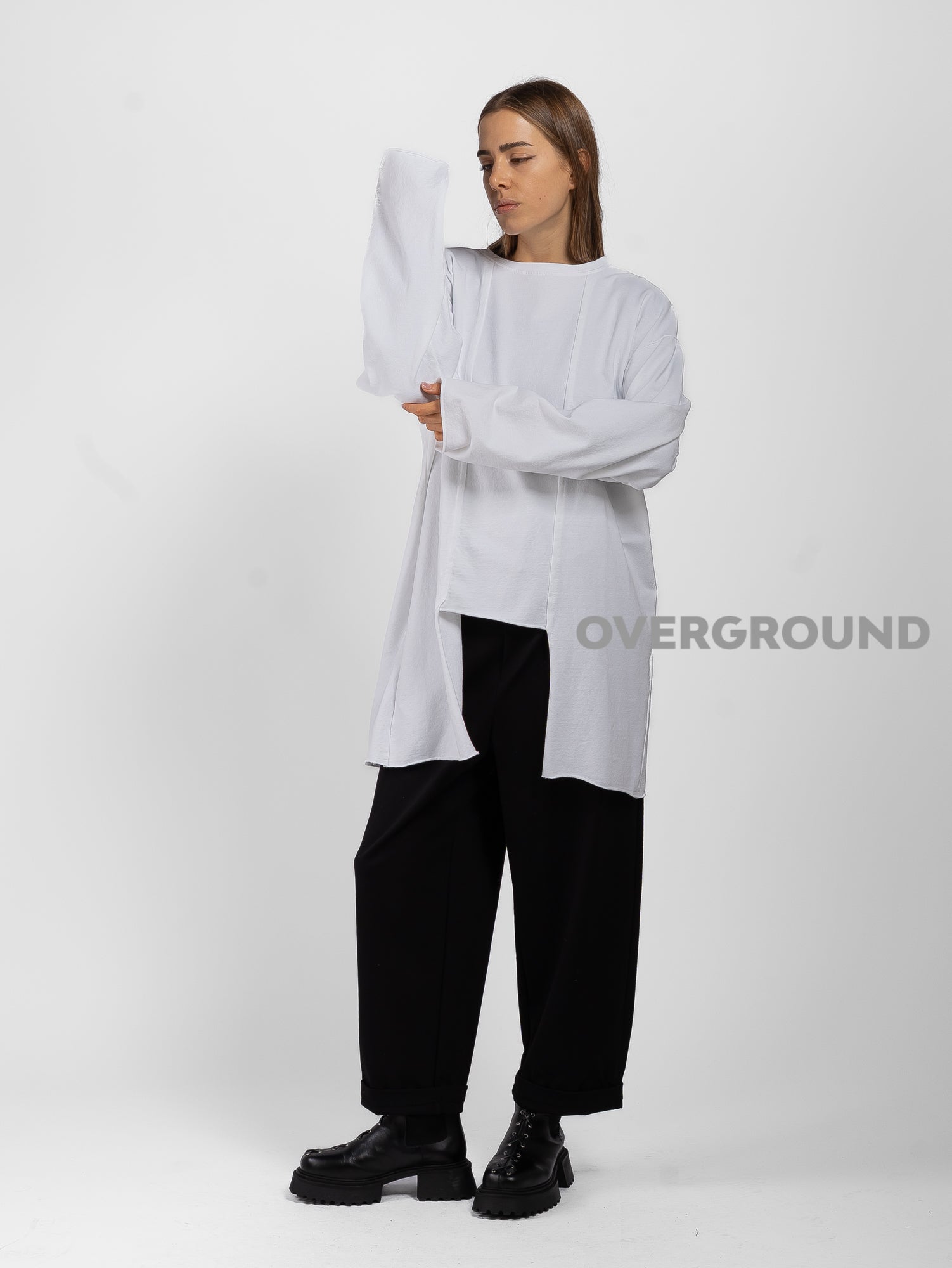 MAGLIA OVER ASIMMETRICA CON CUCITURE