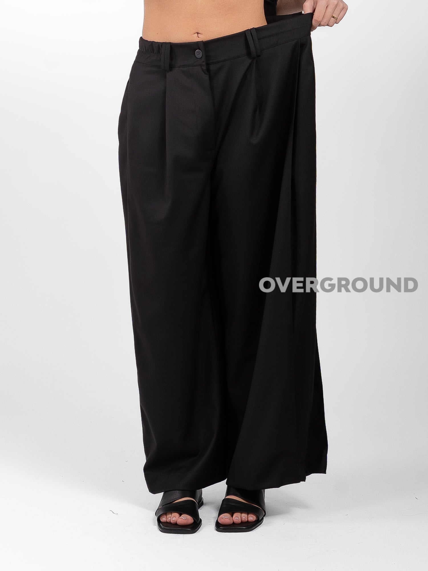 PANTALONE OVER CON CUCITURE DAVANTI E BOTTONE IN FONDO - OVERGROUND STORE