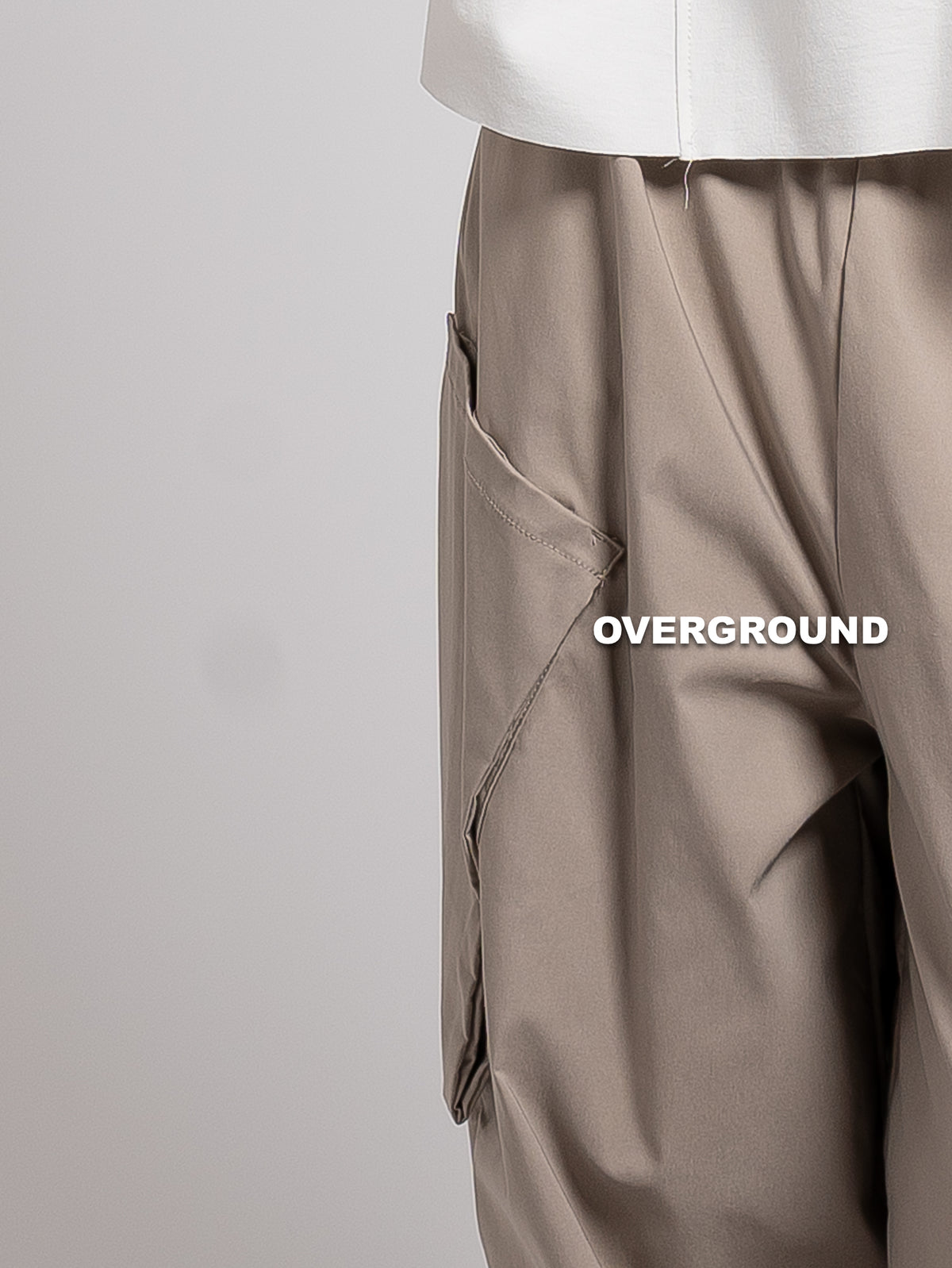 PANTALONE OVER CON TASCONI OBLIQUI