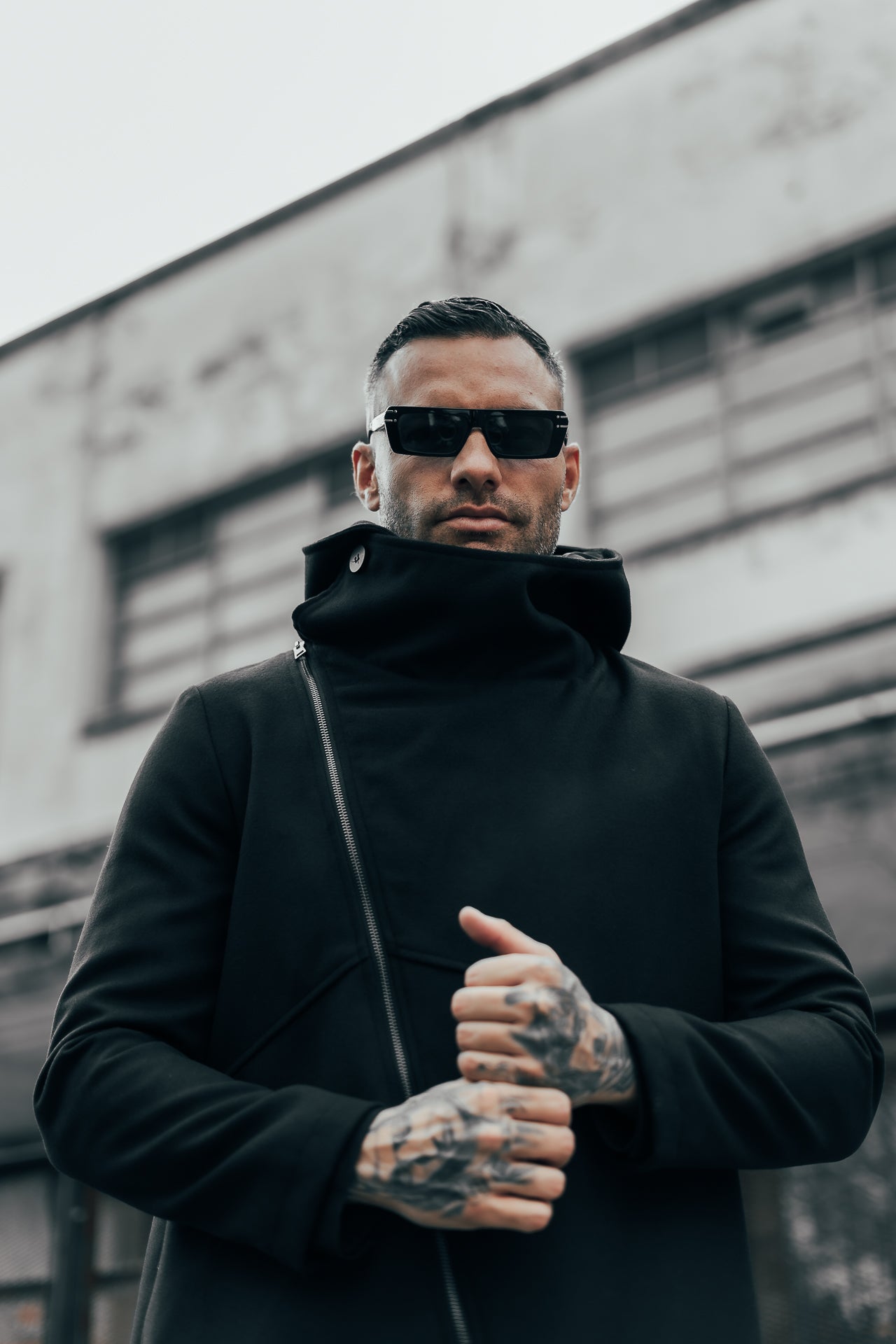 Giaccone con cerniera trasversale e bottone a chiudere - OVERGROUND STORE