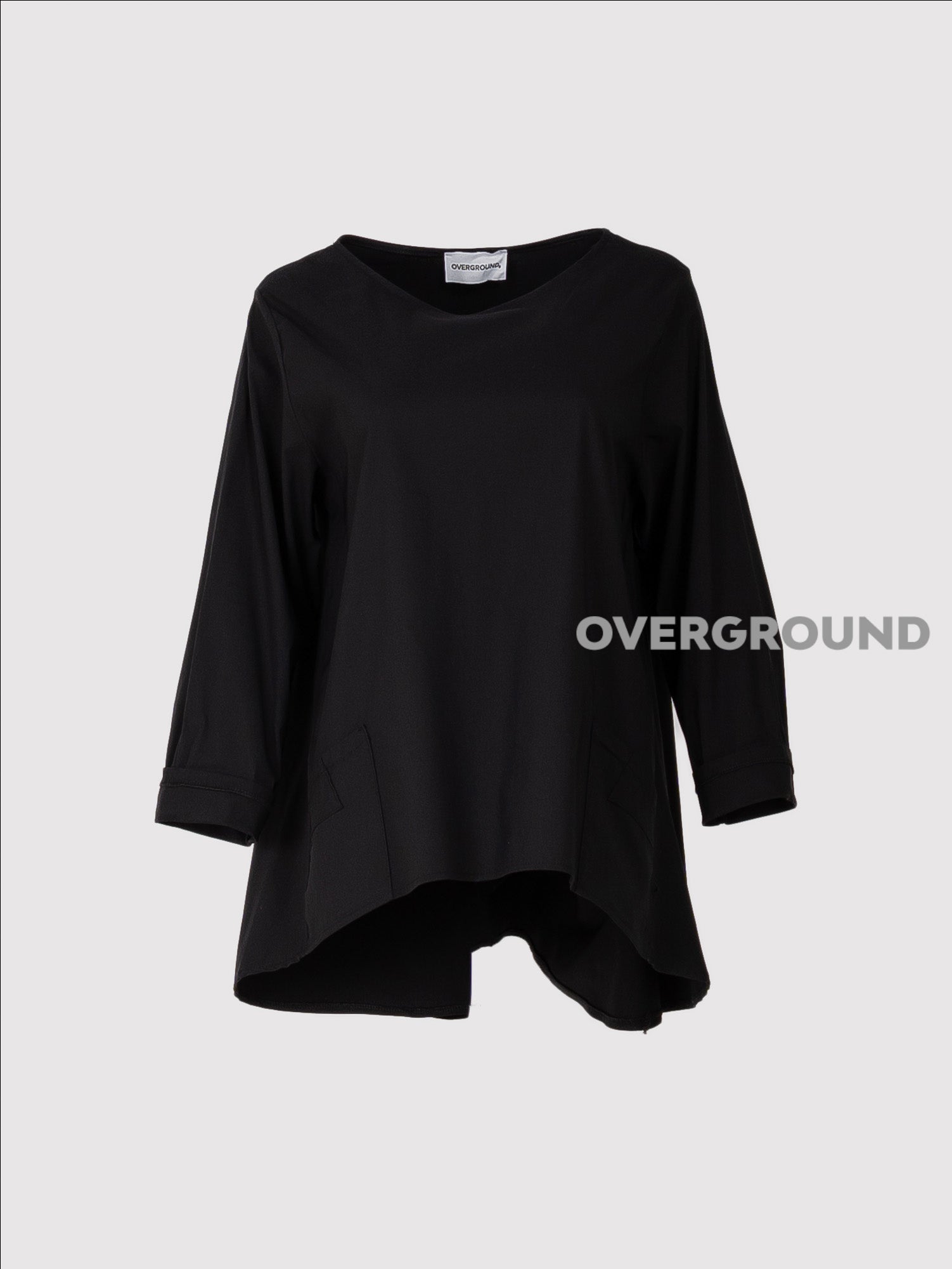 BLUSA LARGA ASIMMETRICA CON TASCHE LATERALE - OVERGROUND STORE