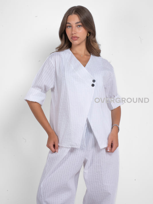 GIACCA ASIMMETRICA CON ABBOTTONATURA CENTRALE - OVERGROUND STORE