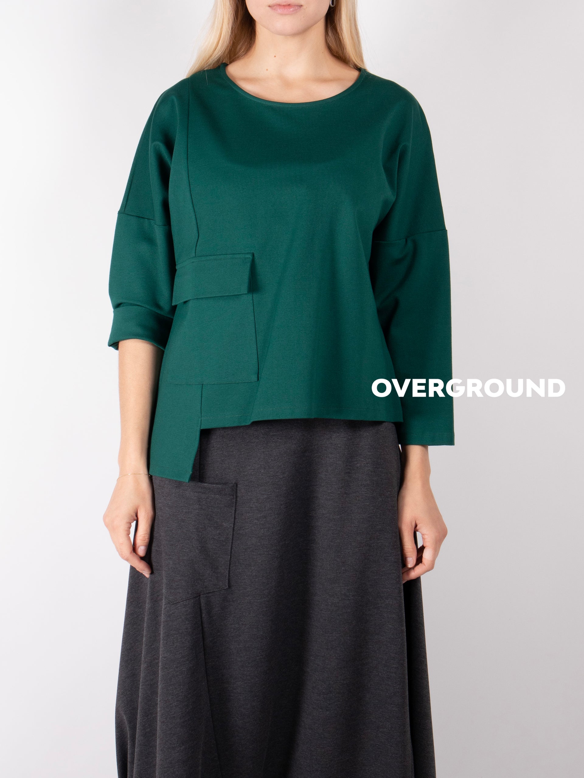 Maglia asimmetrica con tasca laterale - OVERGROUND STORE