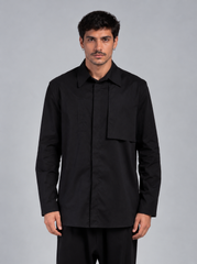 CAMICIA CON PATTINA LATERALE E BOTTONI COPERTI