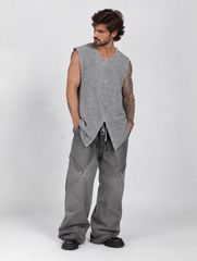 SLEEVELESS TOP WITH CENTRAL SLIT AT THE BOTTOM