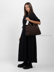 SUEDE BAG WITH WOVEN HANDLE