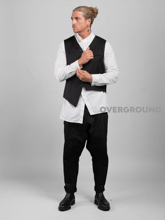 VEST WITH ASYMMETRIC BUTTONING 