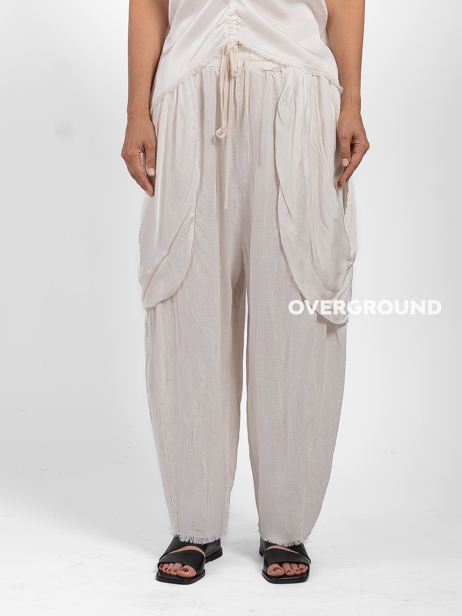 PANTALONE OVER LINO CON TASCONI DAVANTI