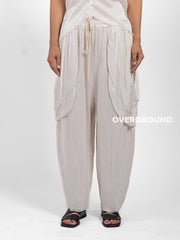 PANTALONE OVER LINO CON TASCONI DAVANTI