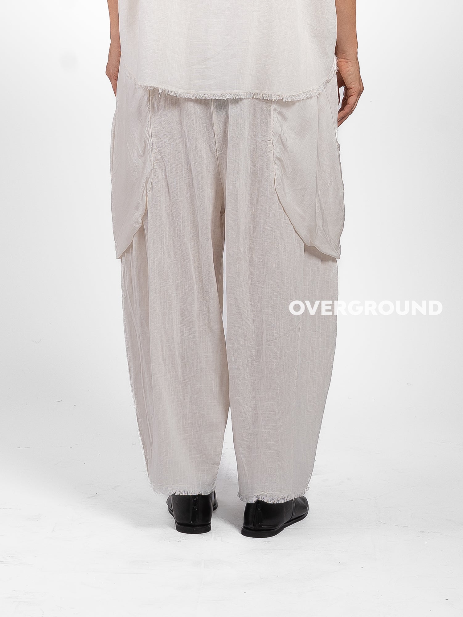 PANTALONE OVER LINO CON TASCONI DAVANTI