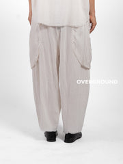 PANTALONE OVER LINO CON TASCONI DAVANTI