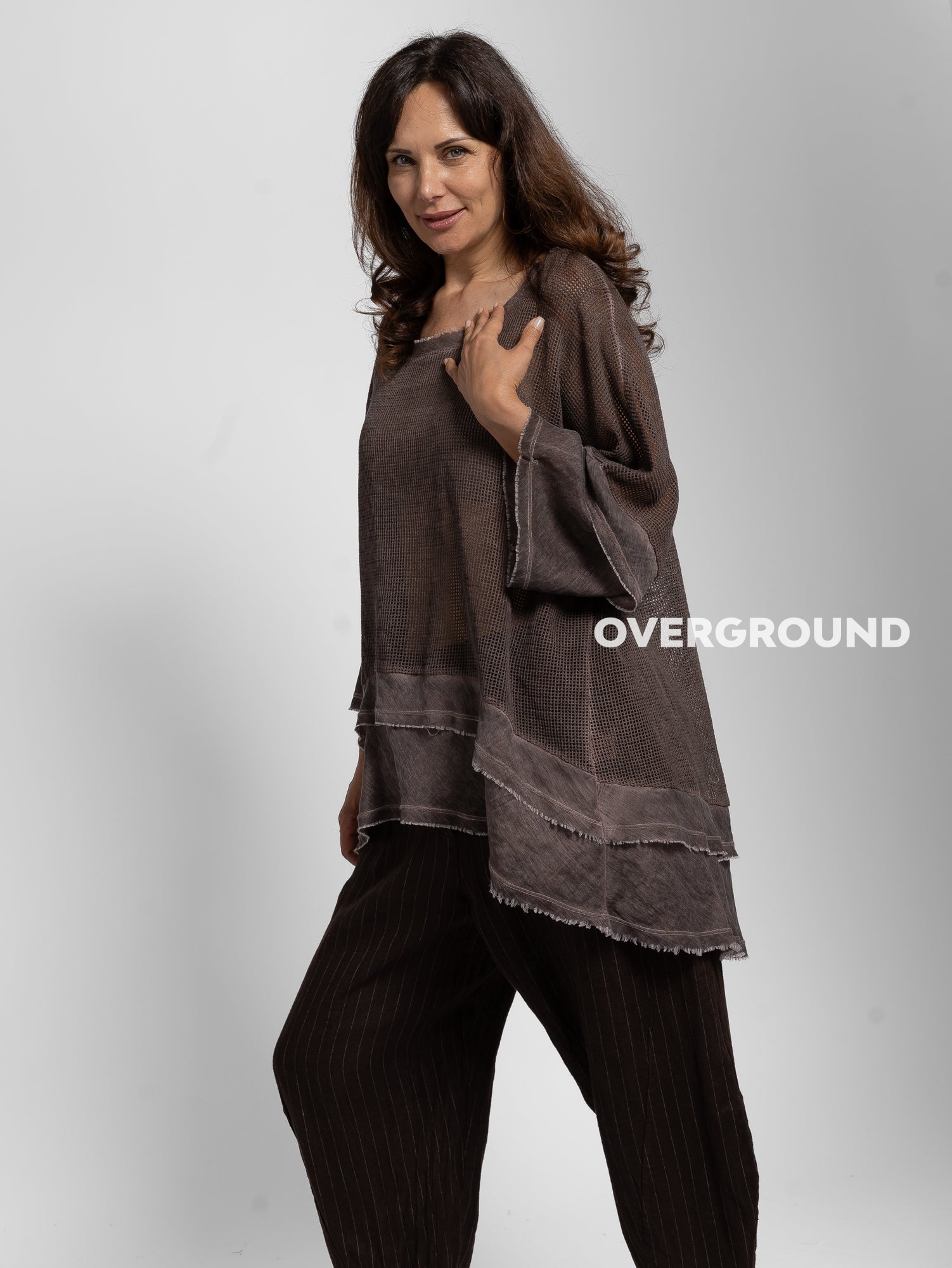 BLUSA OVER CON RETE BALZA IN FONDO