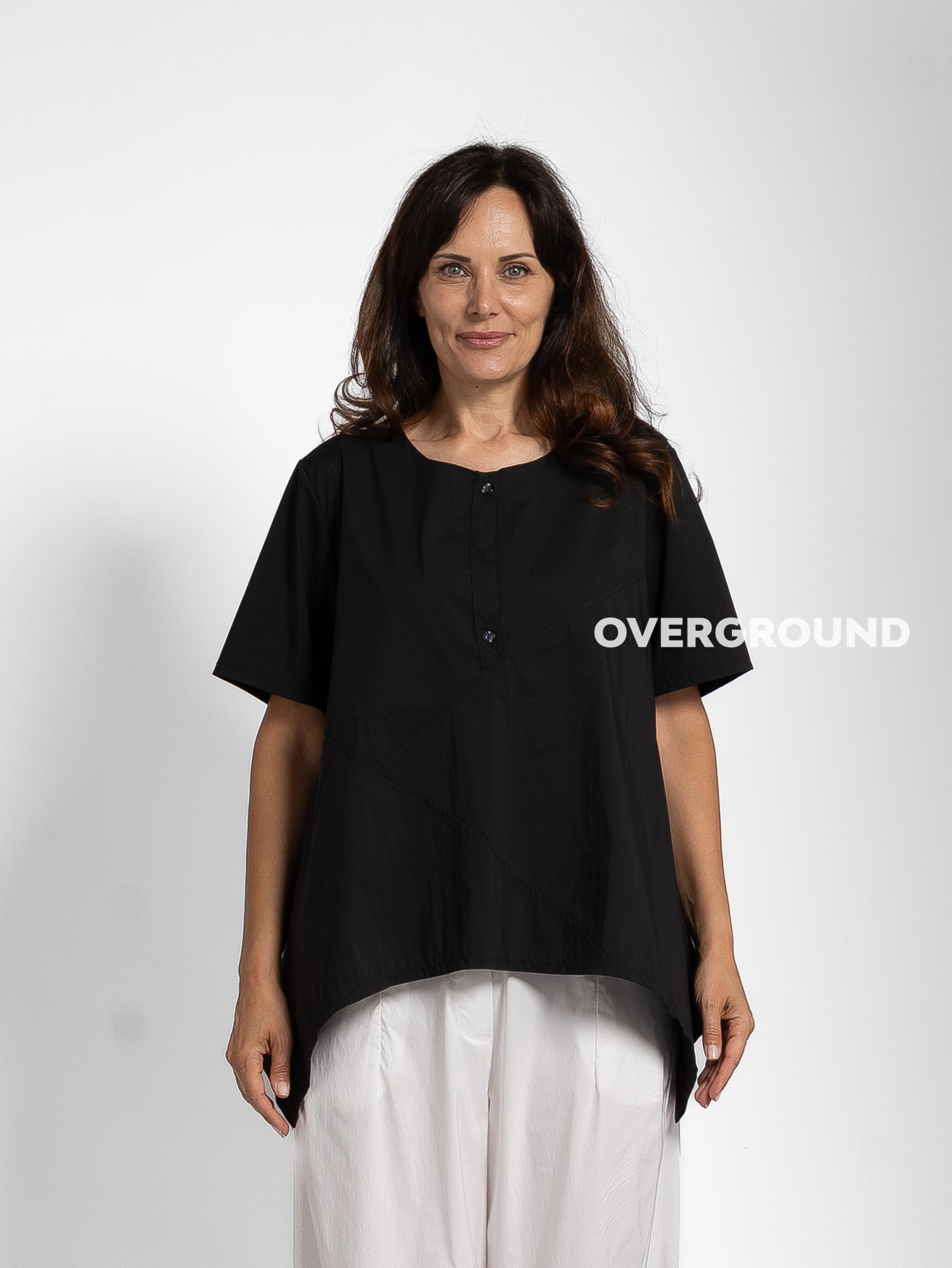 BLUSA OVER CON PUNTE LATERALI