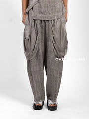 PANTALONE OVER LINO CON TASCONI DAVANTI