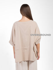 BLUSA OVER CON BALZA CON BOTTONI