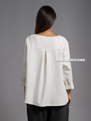 BLUSA OVER CON CUCITURE ASIMMETRICHE