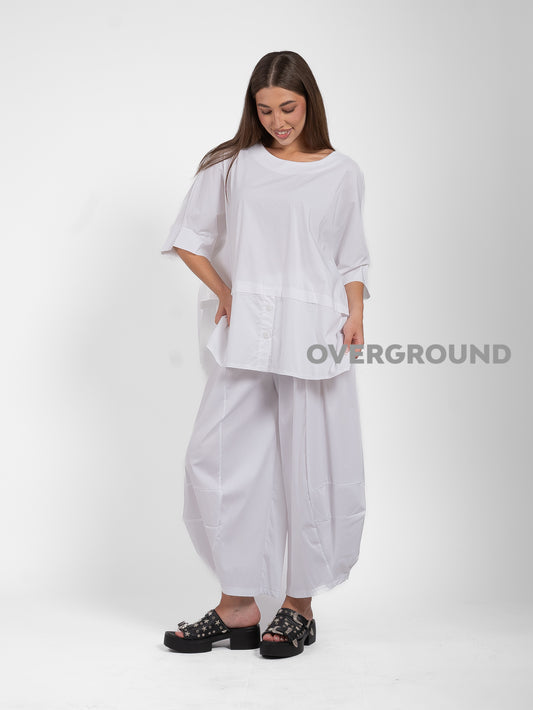PANTALONE OVER CON GAMBULE CON RIPRESA IN FONDO