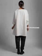 BLUSA OVER LUNGA CON CUCITURE E TASCONE