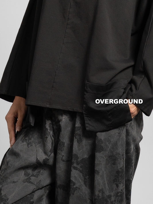 MAGLIA OVER CON CUCITURA E TASCHINI FRONTALI
