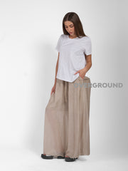 PANTALONE OVER VELATO CON GAMBULE LARGO