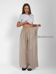 PANTALONE OVER VELATO CON GAMBULE LARGO