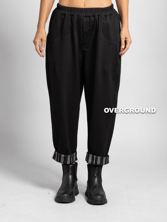 PANTALONE OVER GAMBULE LARGO, CUCITURE, RISVOLTINI A RIGHE E PATTINA SUL RETRO - OVERGROUND STORE 