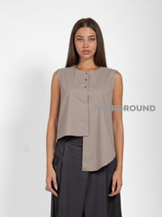 GILET ASIMMETRICO CON PUNTE