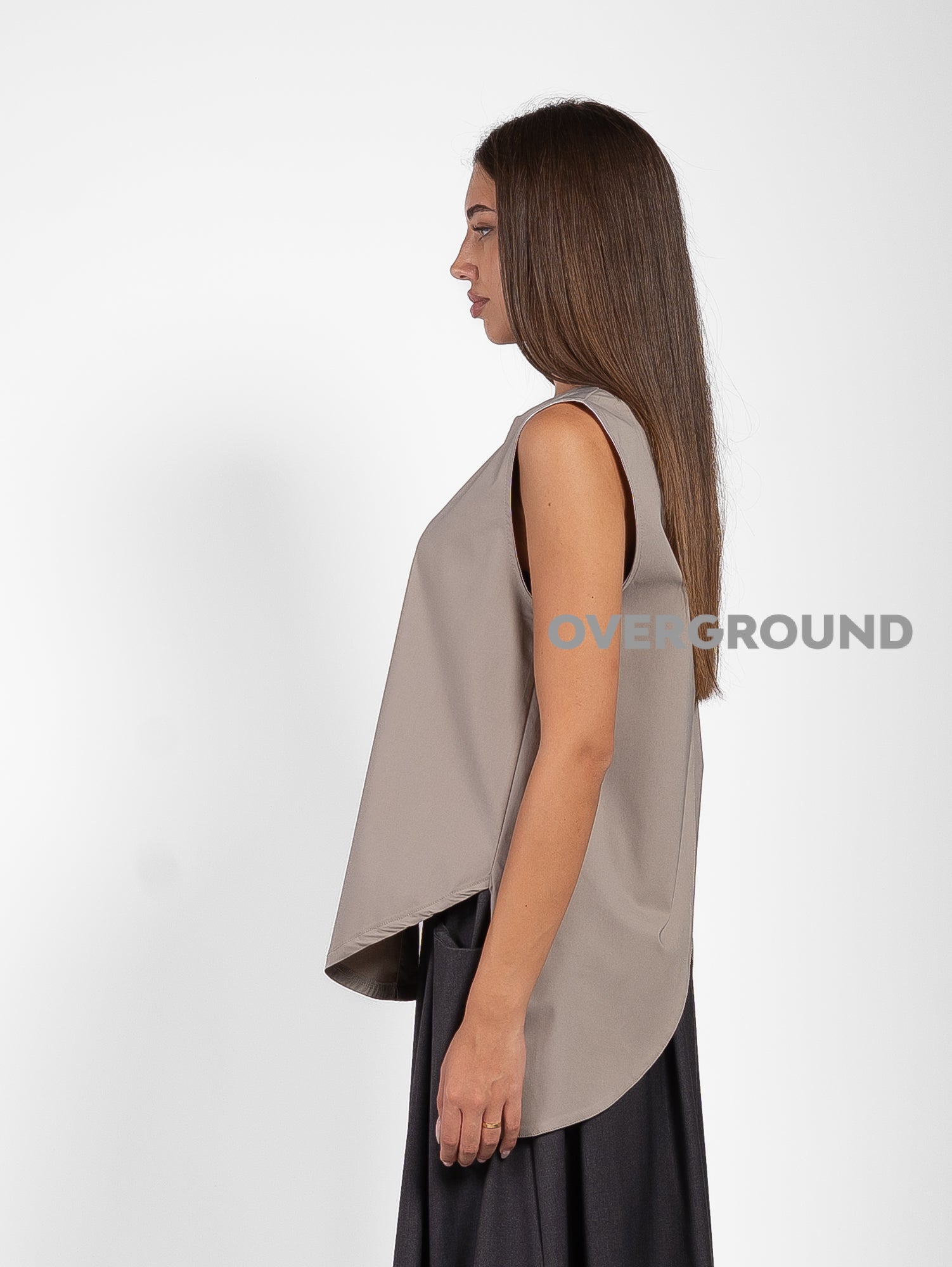 GILET ASIMMETRICO CON PUNTE