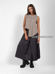 GILET ASIMMETRICO CON PUNTE