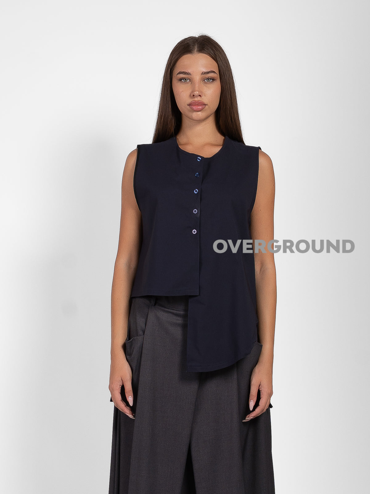 GILET ASIMMETRICO CON PUNTE