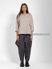 PANTALONE OVER CON TASCONI OBLIQUI