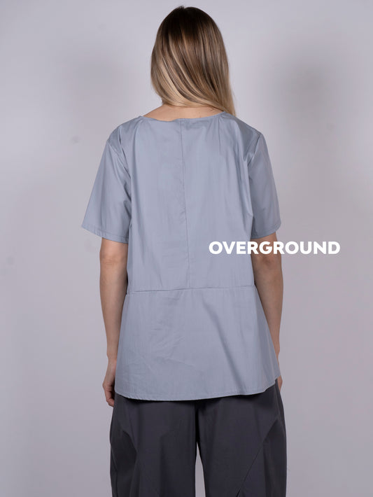 BLUSA ASIMMETRICA CON BALZA