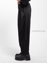 PANTALONE OVER RIGATO CON CUCITURE SUL GAMBULE