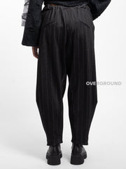 PANTALONE OVER RIGATO CON CUCITURE SUL GAMBULE