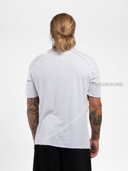 T-SHIRT CON BOTTONE