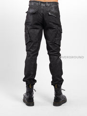 PANTALONE CON TASCHE EFFETTO LAMINATO