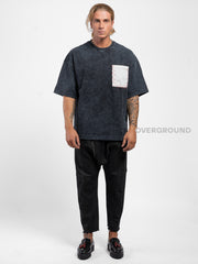T- SHIRT OVER CON MANICHE LARGHE E TASCHINO