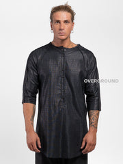 Maglia asimmetrica con bottoni